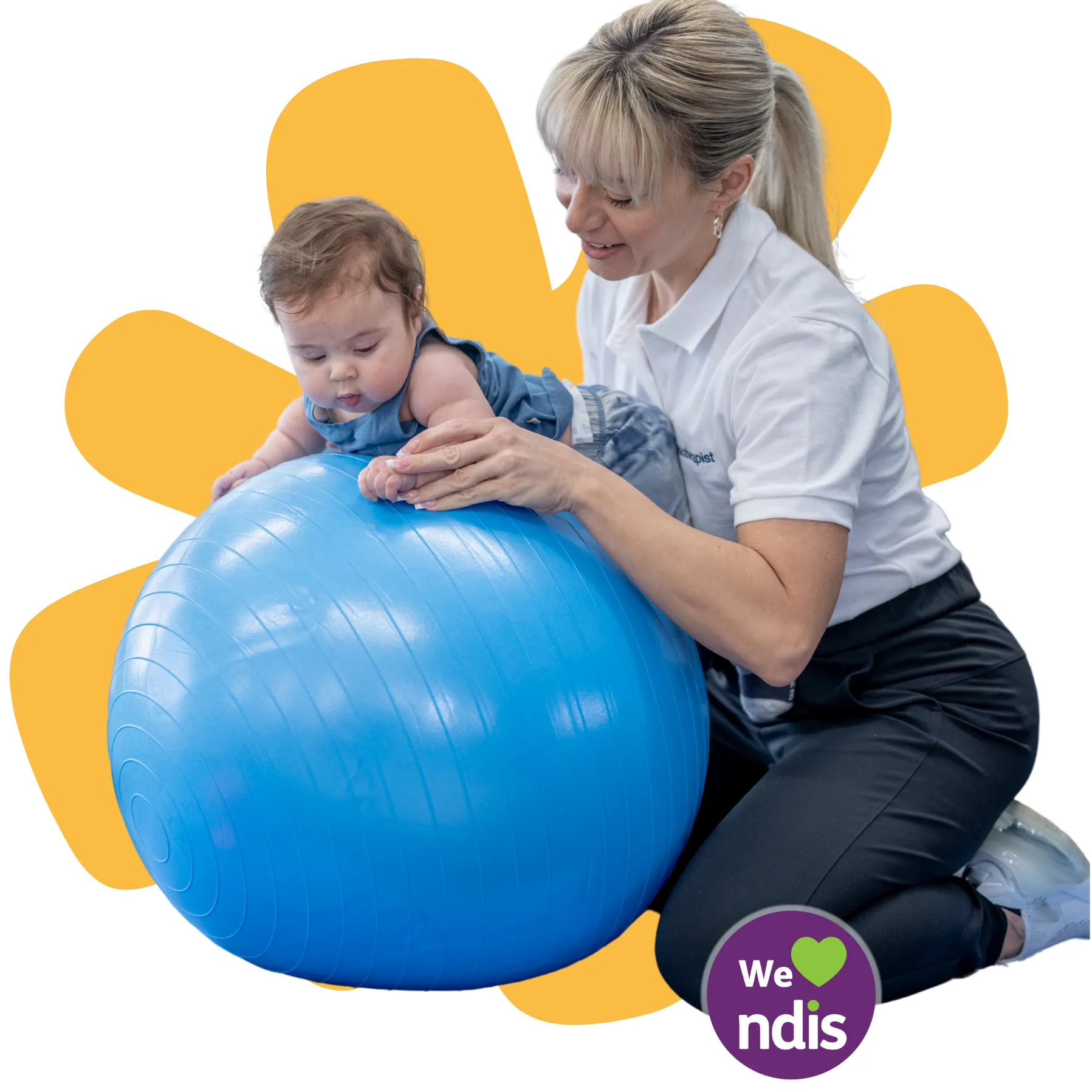A child receiving physiotherapy while balancing on a therapy ball.