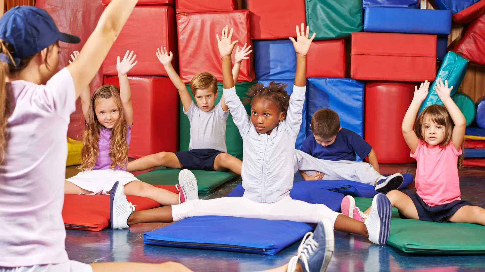 Children in physiotherapy class building strength and flexibility for hypermobility autism spectrum disorder
